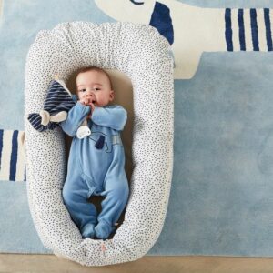 Reducteur de lit bébé